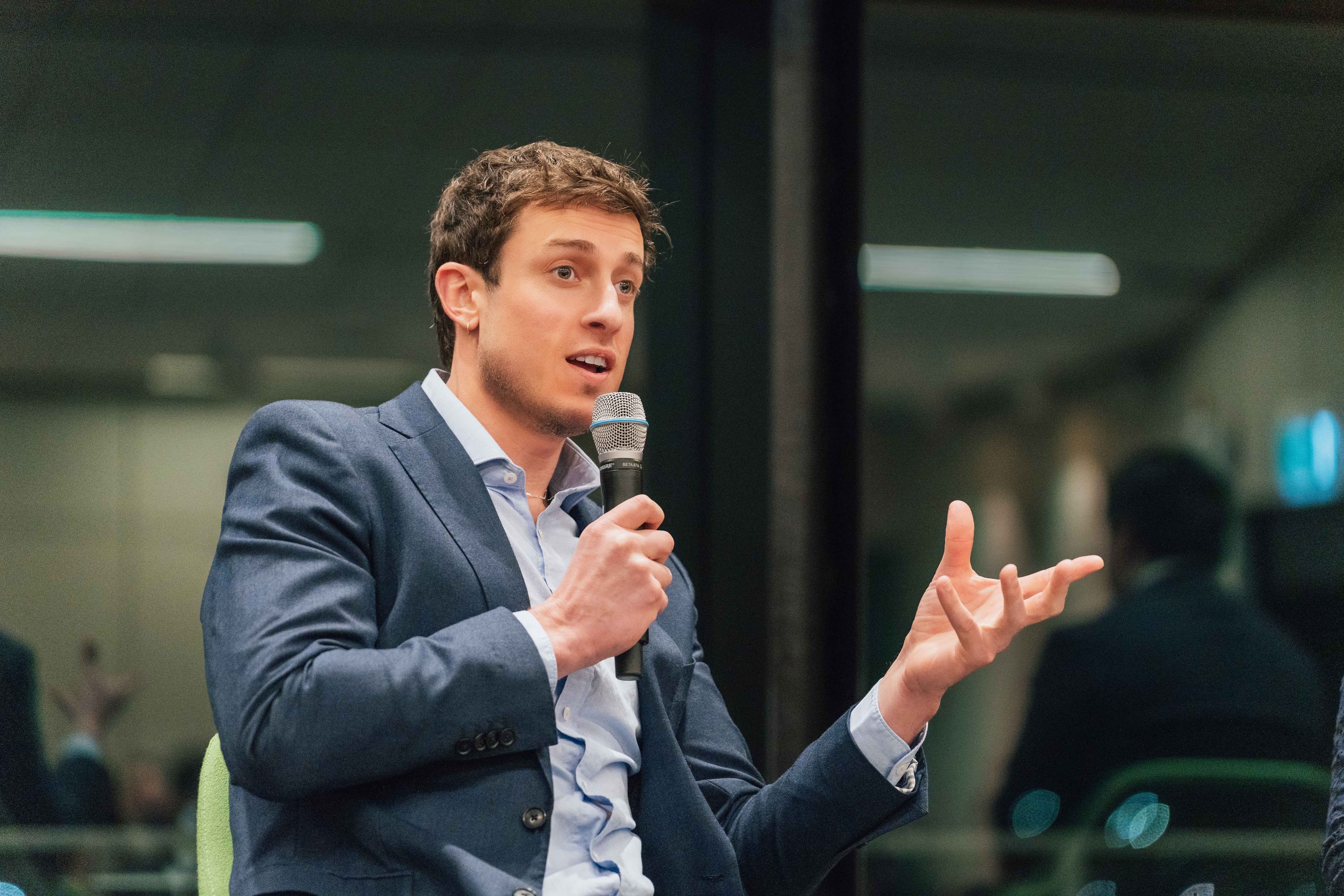 Chris Bush speaking at a panel event at Monash University