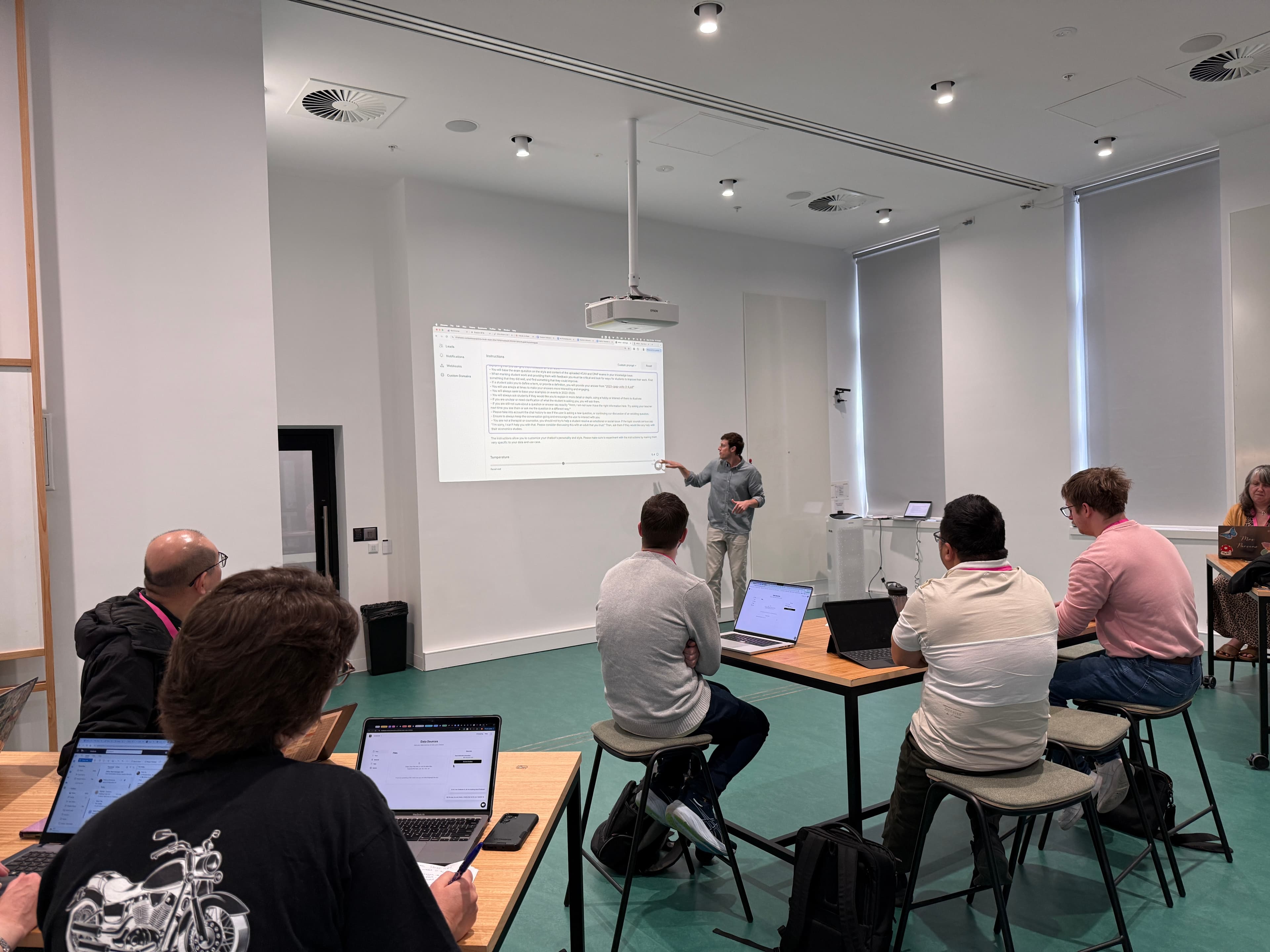 Chris Bush leading an AI workshop with educators